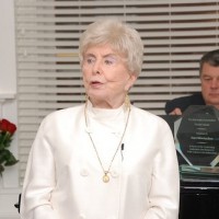 Kaya Mirecka Ploss recognized by the Kosciuszko Foundation for her contributions to the Polish-American community (pictured in the background: Alex Storozynski then-Kosciuszko Foundation's President) (Photo: Courtesy of the Kosciuszko Foundation)