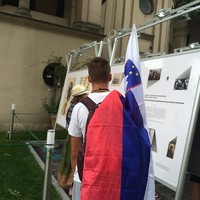 People carefully view the bilingual (English/Polish) exhibit. (Photo: Dariusz Paczkowski)