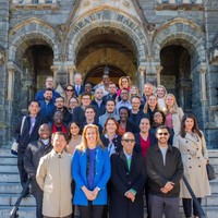 Participants of the 2023 Georgetown Leadership Seminar in front of Georgetown University's Healy Hall (Photo: Courtesy of Sebastian Kęciek)