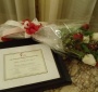 The Spirit of Jan Karski award and flowers in the Polish colors, both ready to give to Ambassador Power (Jane Robbins)