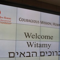 A welcome from Baker & McKenzie in three languages