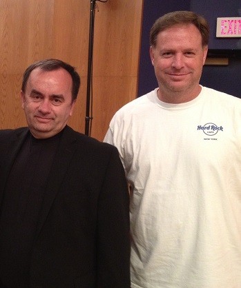 Father Patrick Desbois with participant Dave Barrett