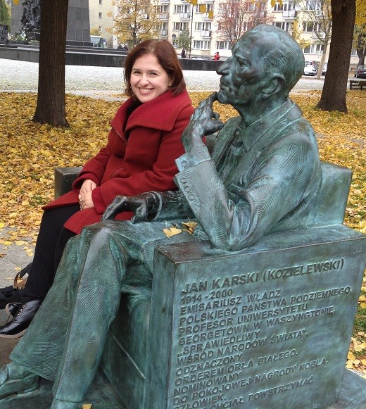 Sisi Melchiorre at Warsaw's Jan Karski Bench (photo by Wanda Urbanska)