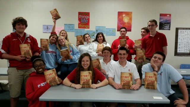 Charlotte Catholic High School students show off the copies of Karski's book donated by the Jan Karski Edcational Foundation (Photo: Donna M. Tarney)