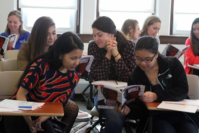 Emmanuel College's students reading Karski comic book (Photo: Katie Arsenault)